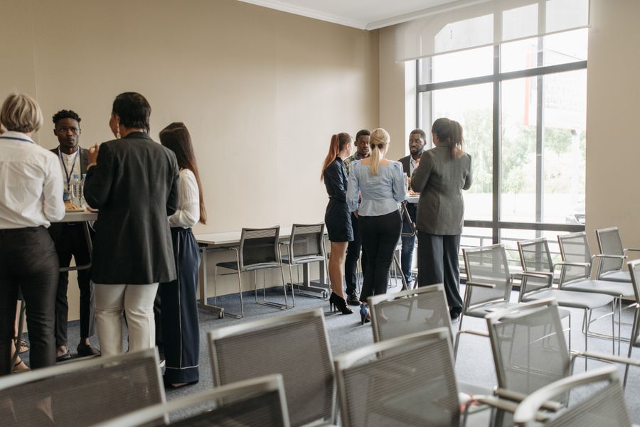 A group talking together in a bright room