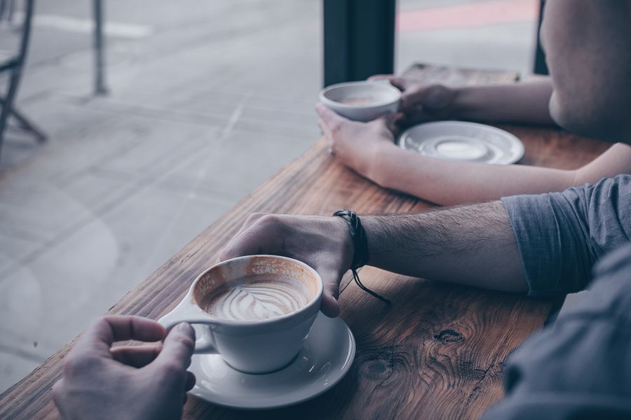 Two cups of coffee on a table