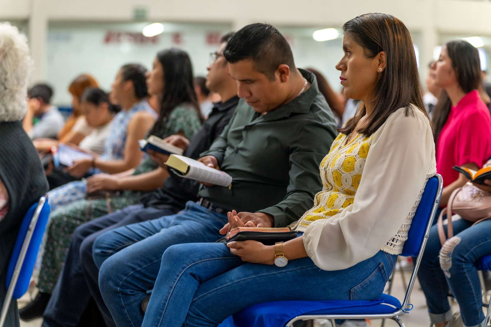 Adults and youth gathered for a class